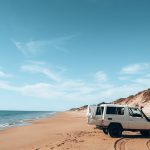 a van parked on a beach